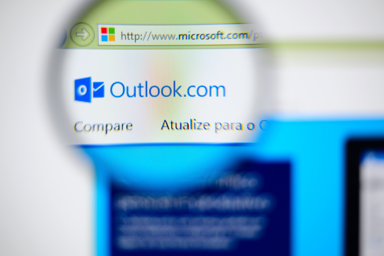 Magnifying glass pointed at the word Outlook.com