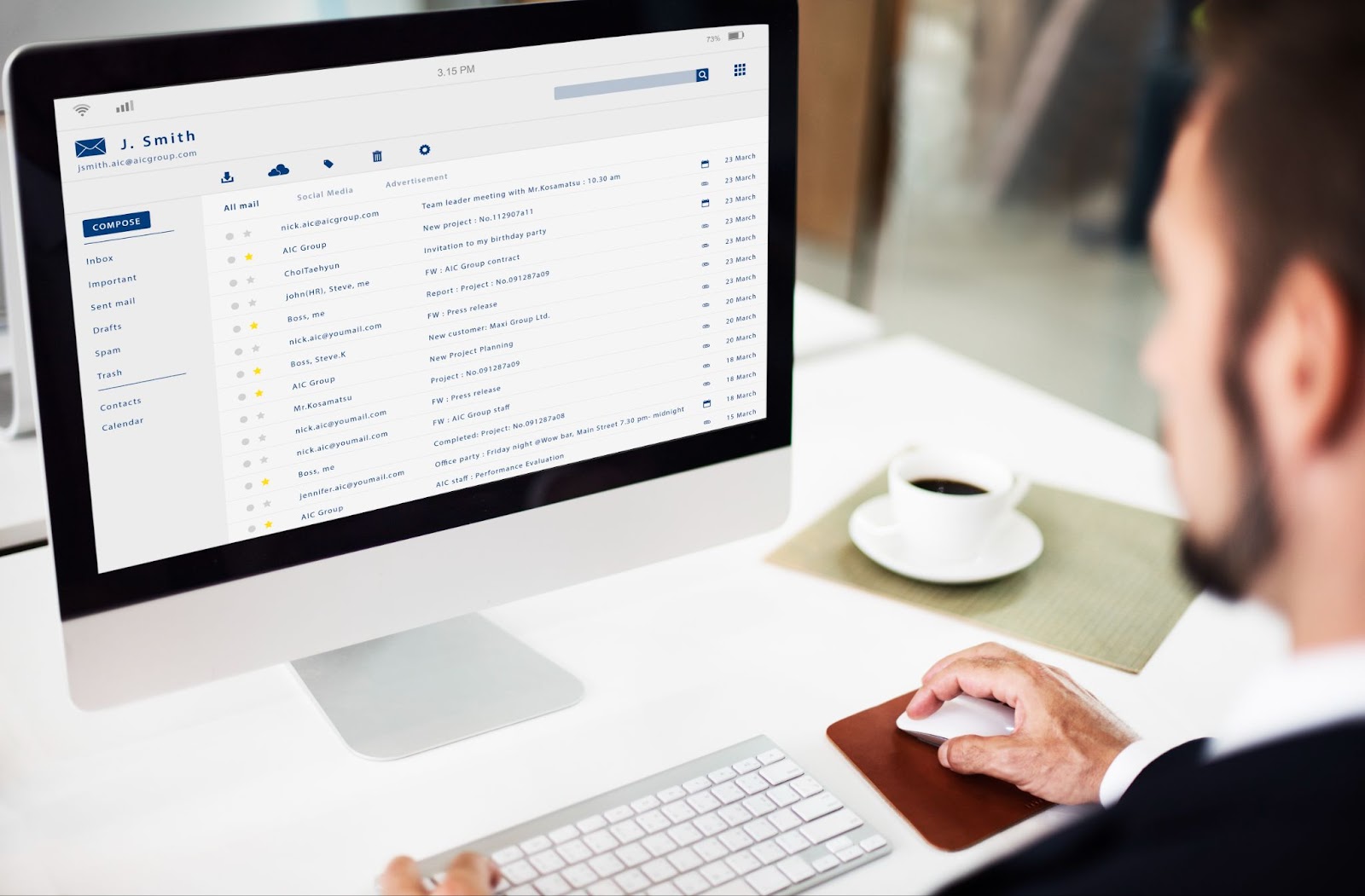 Man looking on email inbox messages in computer